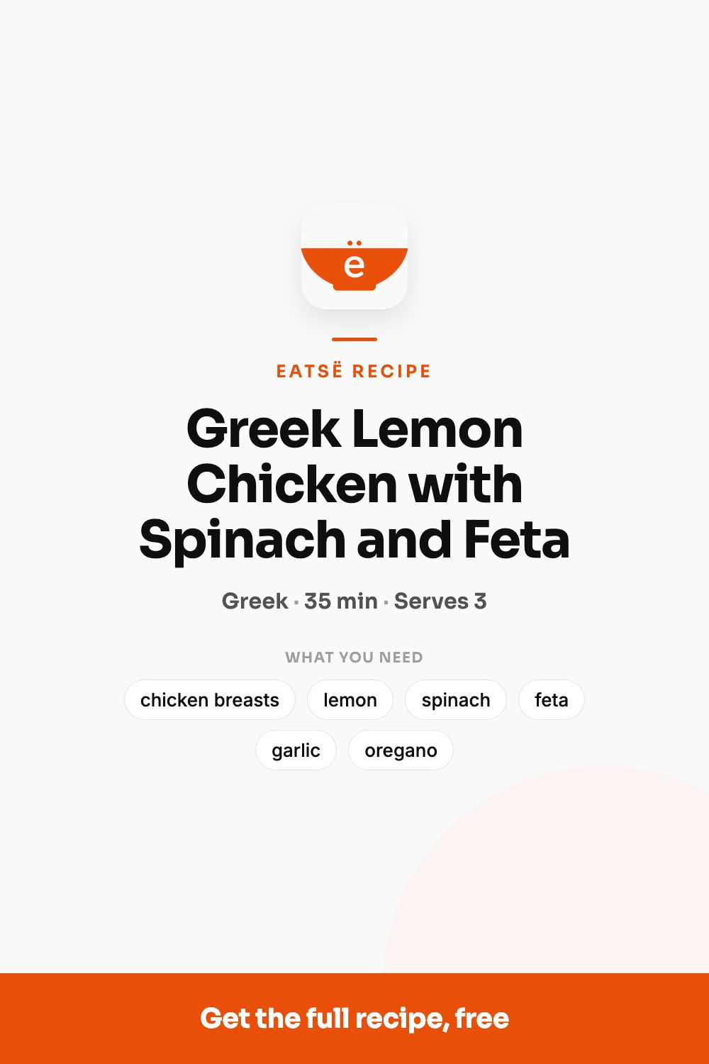 Sliced lemon chicken over wilted spinach with crumbled feta in a cast-iron skillet